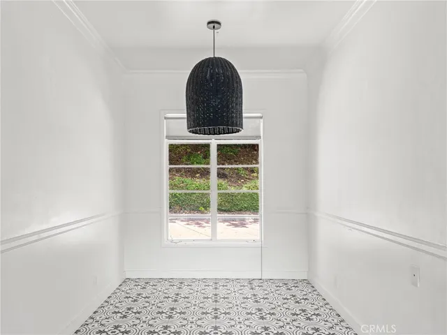 a view of a bedroom with a window