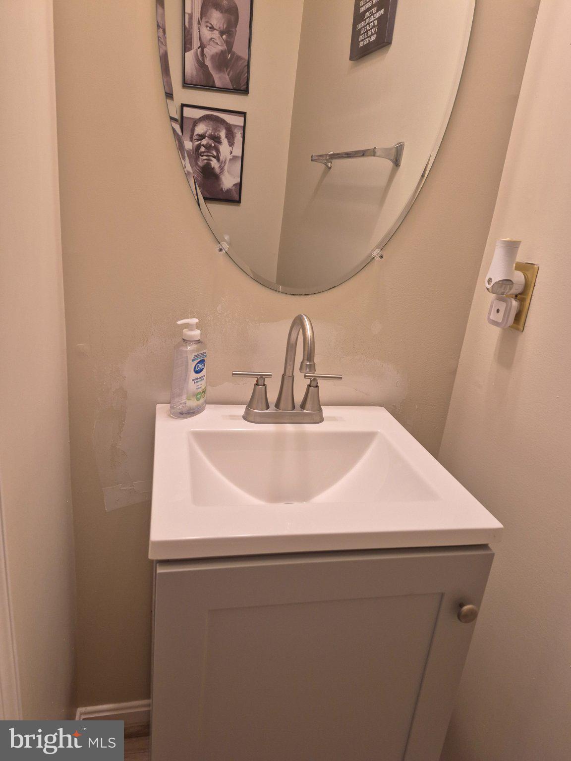 15411 Wylie Road Brandywine, MD 20613 - Photo 7 of 38 Chic half-bath with modern elegance.