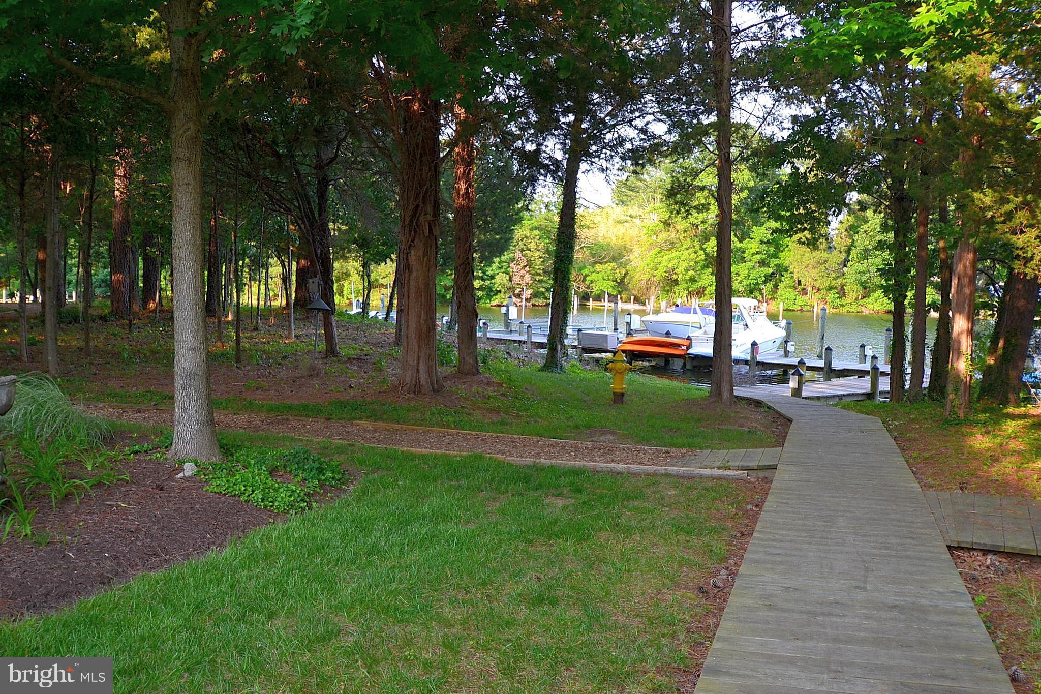 670 Ruxton Road, Unit 62 Dowell, MD 20629 - Photo 22 of 25 Walkway to community marina and deeded boat slip.