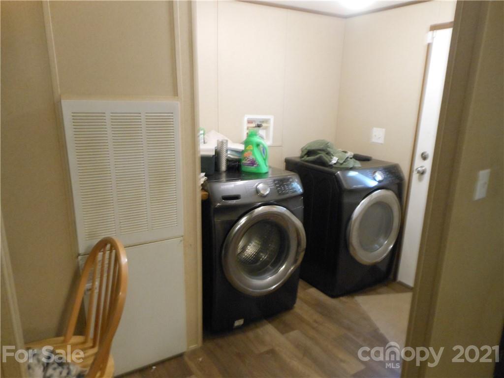 91 Foster Lake Road Blacksburg, SC 29702 - Photo 16 of 31 a utility room with dryer and washer