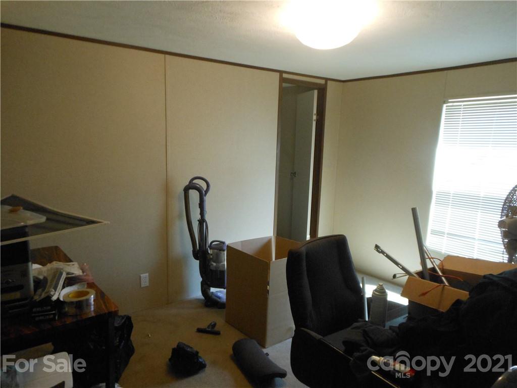 91 Foster Lake Road Blacksburg, SC 29702 - Photo 18 of 31 a view of a room with gym equipment