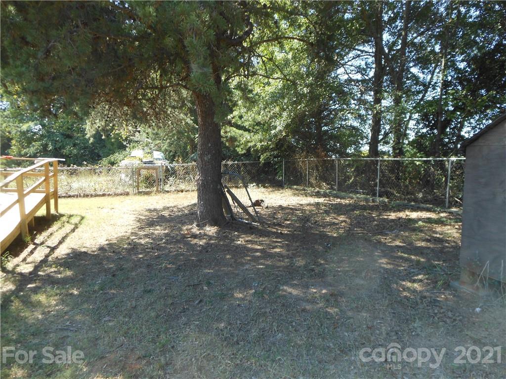 91 Foster Lake Road Blacksburg, SC 29702 - Photo 6 of 31 a view of a tree in a yard