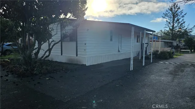 a view of backyard and entertaining space