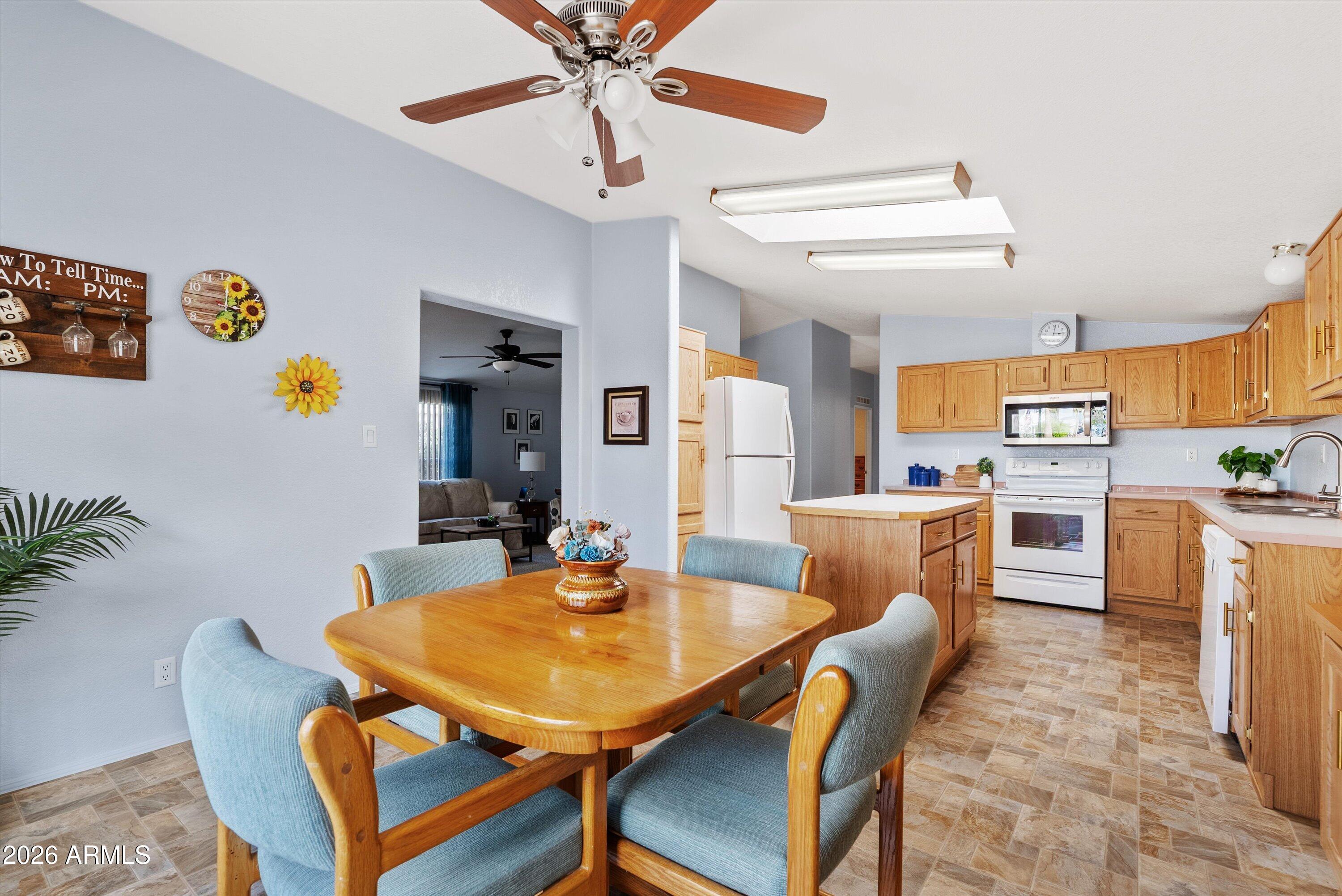 3700 South Tomahawk Road, Unit 91 Apache Junction, AZ 85119 - Photo 7 of 29 a view of a dining room with furniture