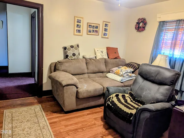 a living room with furniture and a couch