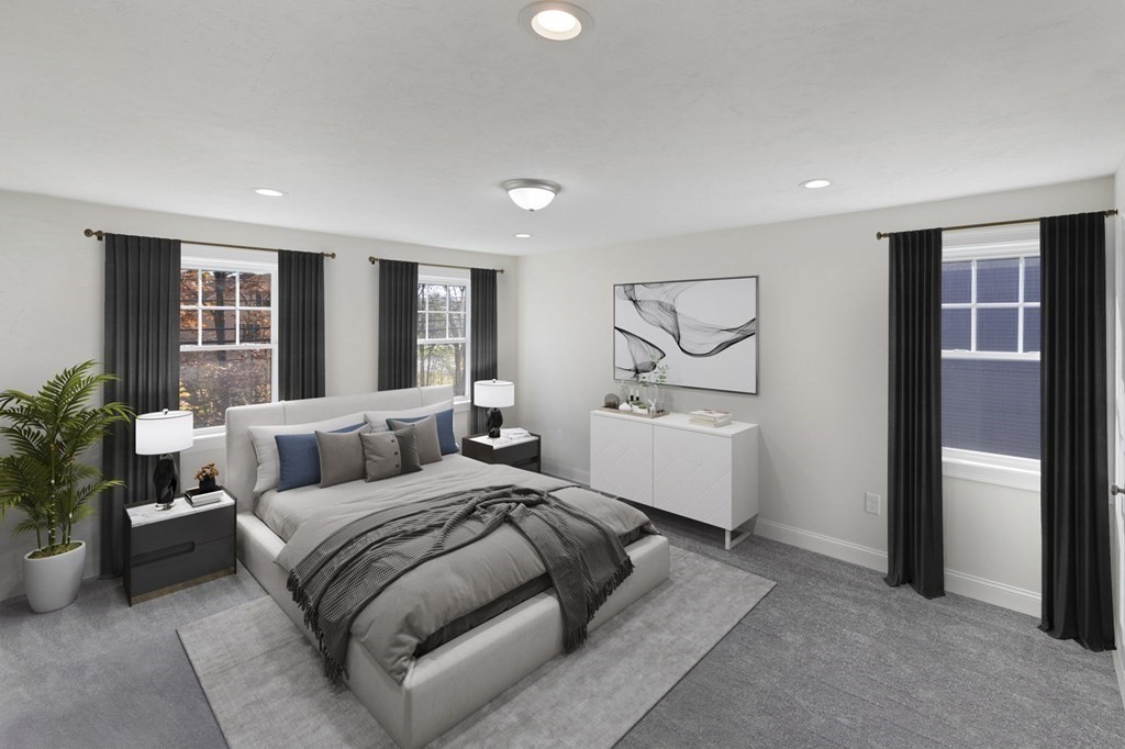 171 Rangeway Road North Billerica, MA 01862 - Photo 14 of 35 a bedroom with a large bed and windows