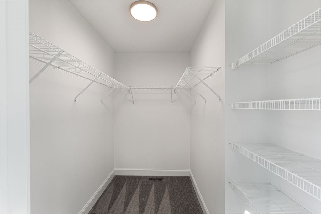 171 Rangeway Road North Billerica, MA 01862 - Photo 17 of 35 a view of a room with racks on the wall