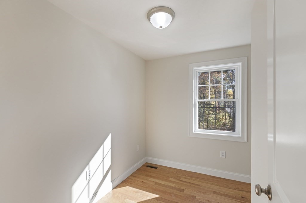 171 Rangeway Road North Billerica, MA 01862 - Photo 18 of 35 an empty room with windows