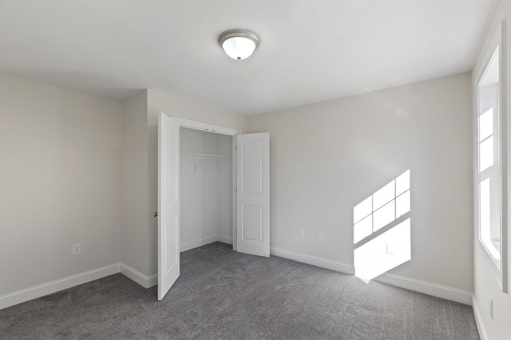 171 Rangeway Road North Billerica, MA 01862 - Photo 19 of 35 a view of an empty room with a window