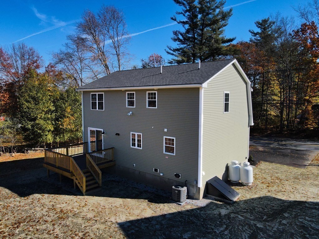 171 Rangeway Road North Billerica, MA 01862 - Photo 31 of 35 a front view of a house with garden