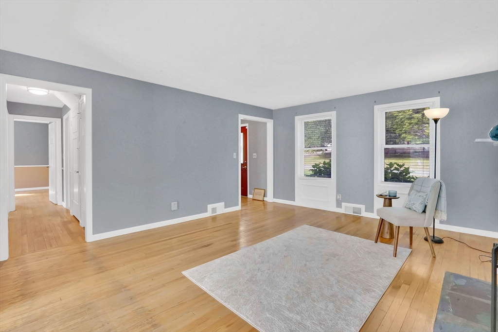 81 Oak Hollow Road Springfield, MA 01128 - Photo 15 of 42 wooden floor in an empty room with a window