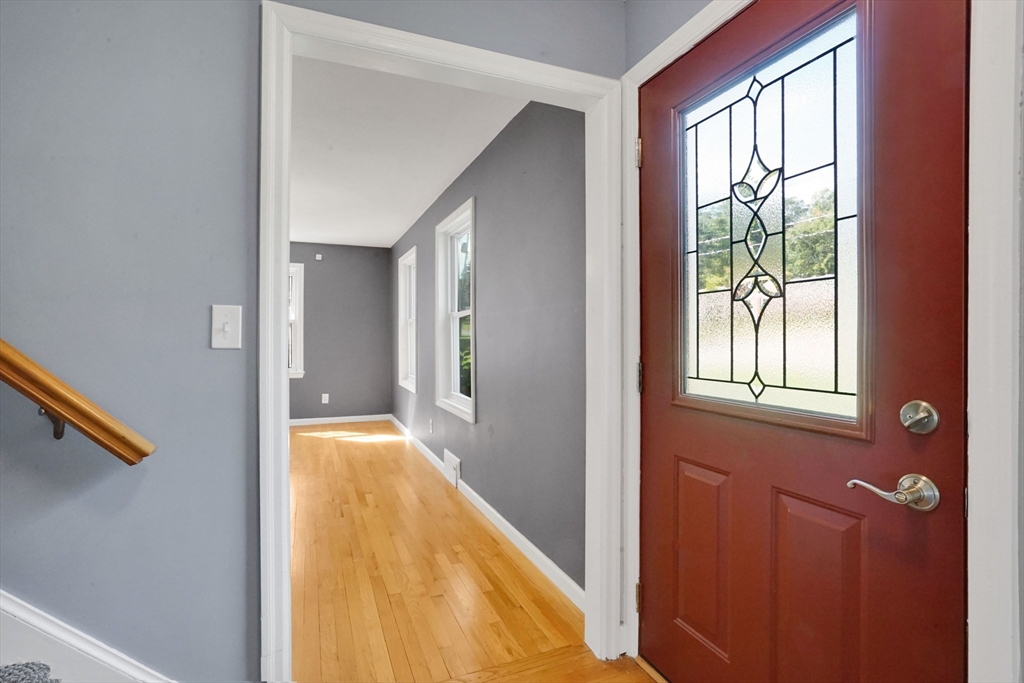 81 Oak Hollow Road Springfield, MA 01128 - Photo 23 of 42 a view of hallway with livingroom and wooden floor