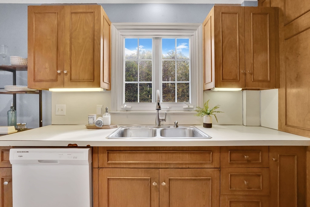 81 Oak Hollow Road Springfield, MA 01128 - Photo 5 of 42 a kitchen with a sink and cabinets