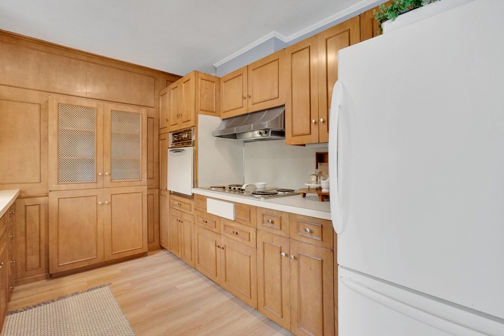 81 Oak Hollow Road Springfield, MA 01128 - Photo 6 of 42 a kitchen with granite countertop cabinets stainless steel appliances and a window