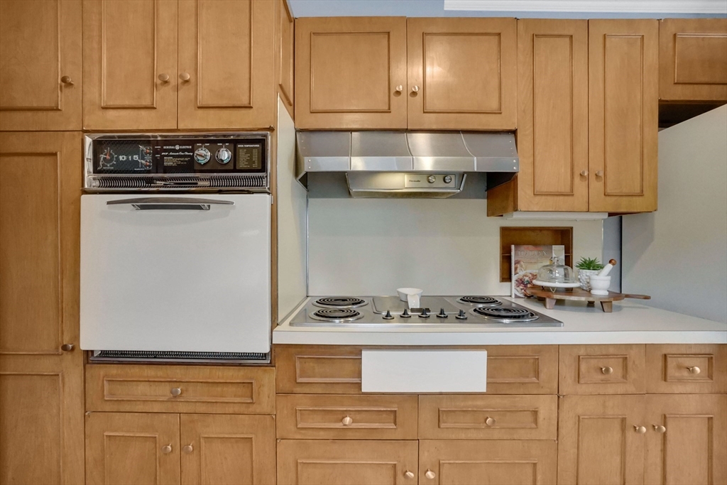 81 Oak Hollow Road Springfield, MA 01128 - Photo 7 of 42 a kitchen with granite countertop cabinets and stainless steel appliances