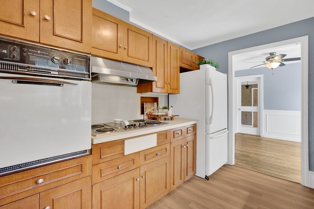 81 Oak Hollow Road Springfield, MA 01128 - Photo 8 of 42 a kitchen with stainless steel appliances granite countertop a refrigerator and a stove