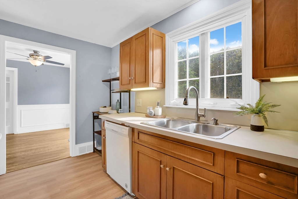 81 Oak Hollow Road Springfield, MA 01128 - Photo 9 of 42 a kitchen with a sink cabinets and window