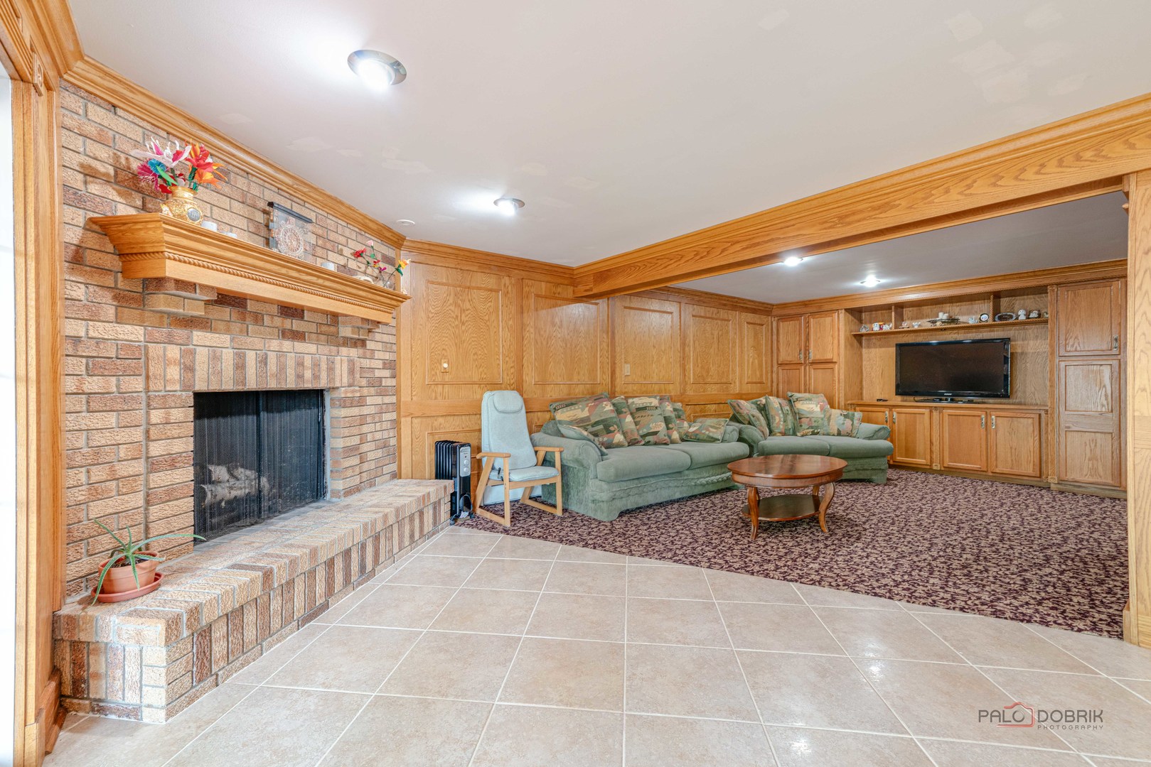 357 Roberts Road Inverness, IL 60010 - Photo 37 of 50 a living room with furniture and a fireplace