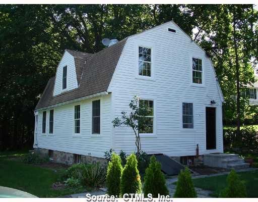 896 Saybrook Road, Unit 4 Haddam, CT 06438 - Photo 1 of 1 a front view of a house with a yard