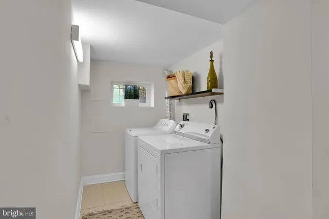 a bathroom with a sink toilet and mirror