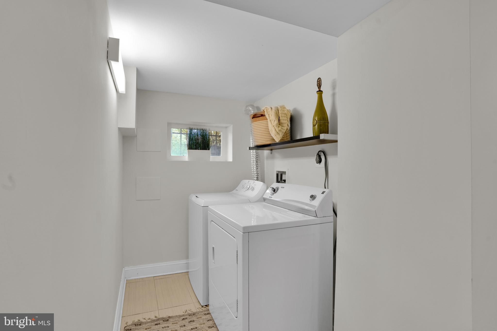 5132 7th Street Northwest Washington, DC 20011 - Photo 28 of 34 a bathroom with a sink toilet and mirror