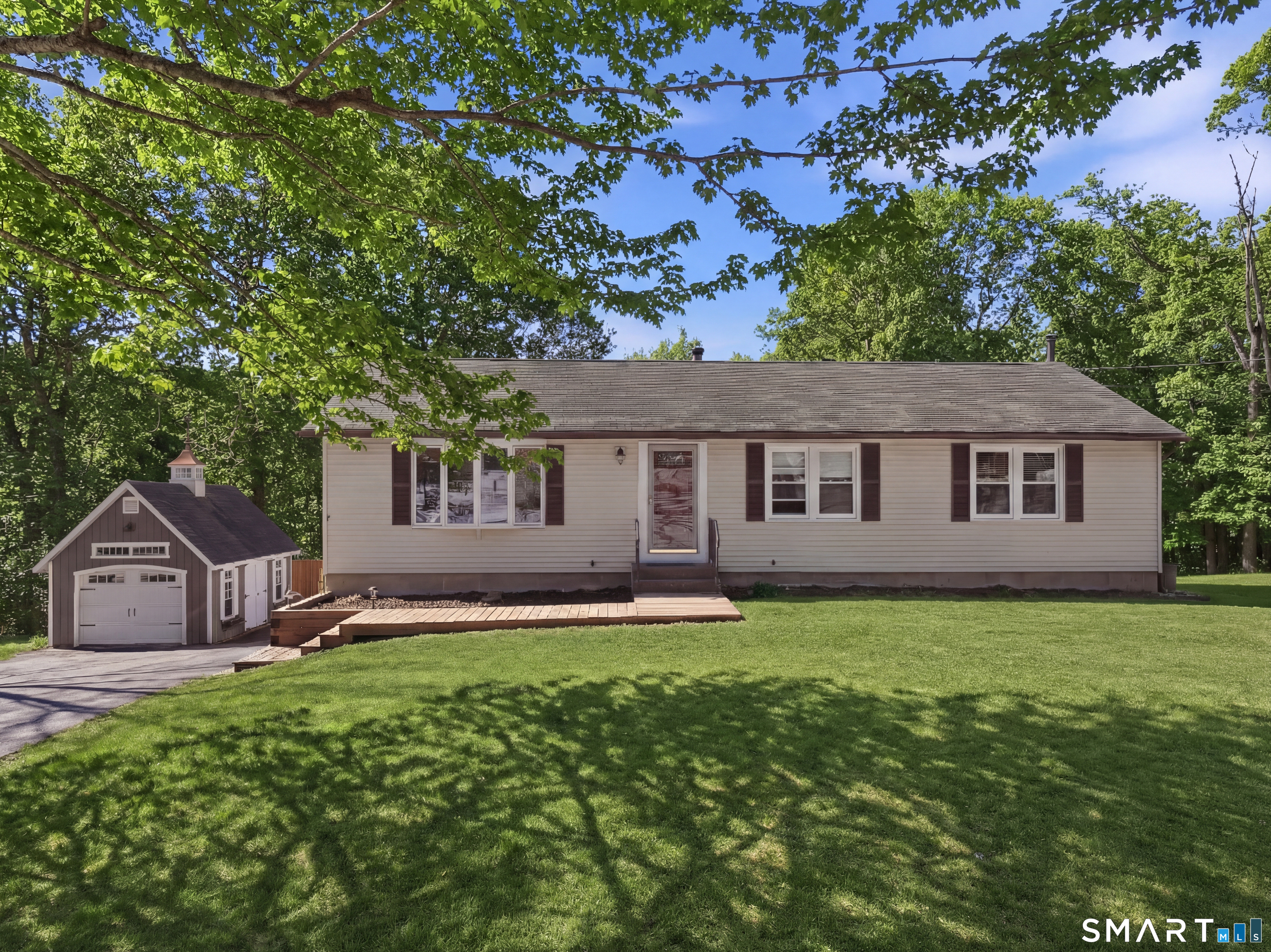 1616 Weed Road Torrington, CT 06790 - Photo 1 of 40 front view of a house with a yard
