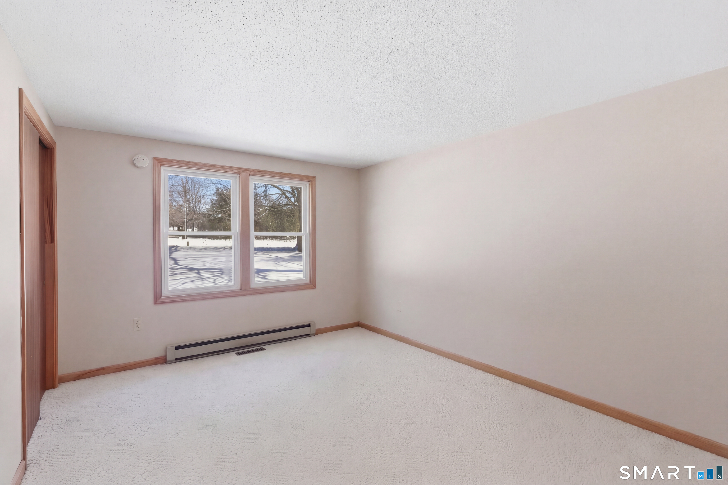 1616 Weed Road Torrington, CT 06790 - Photo 12 of 40 an empty room with a window