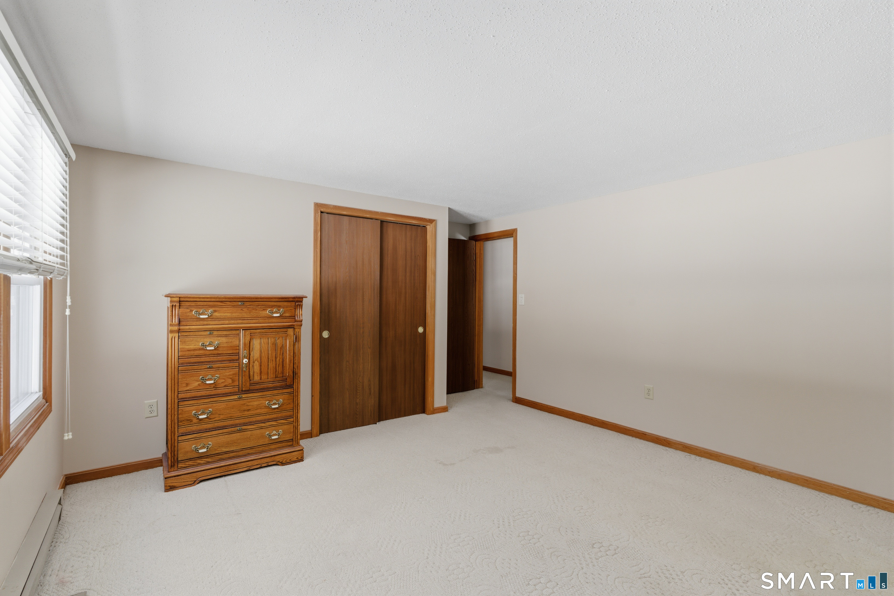 1616 Weed Road Torrington, CT 06790 - Photo 15 of 40 an empty room with closet and a window