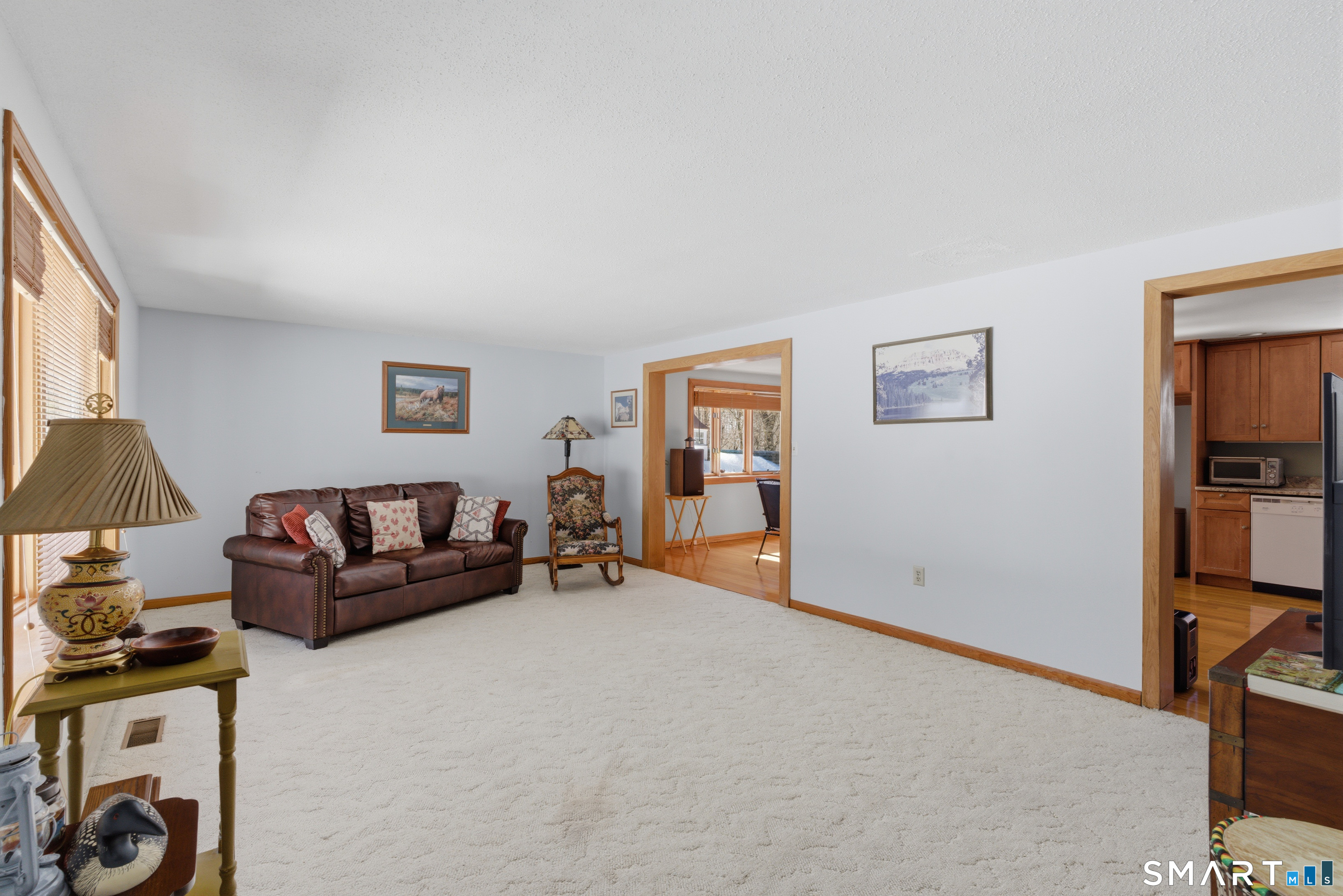 1616 Weed Road Torrington, CT 06790 - Photo 2 of 40 a living room with furniture and a flat screen tv