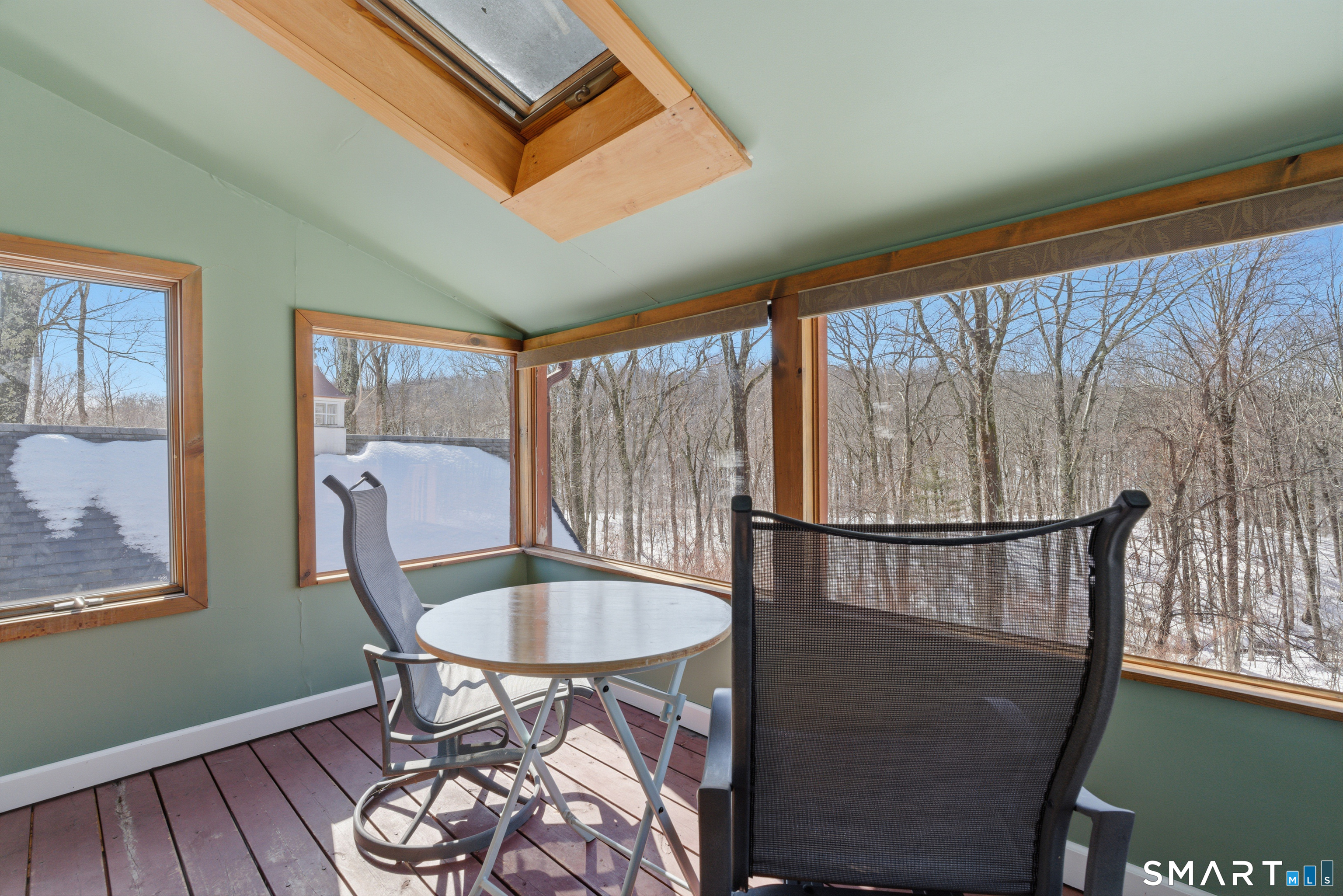 1616 Weed Road Torrington, CT 06790 - Photo 23 of 40 a balcony with table and chairs