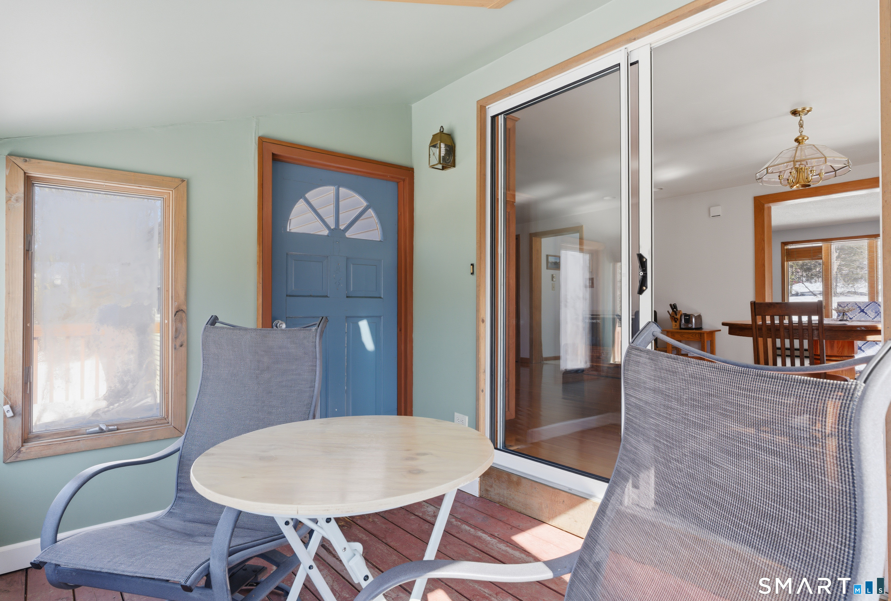 1616 Weed Road Torrington, CT 06790 - Photo 25 of 40 a view of a dining room with furniture window and wooden floor