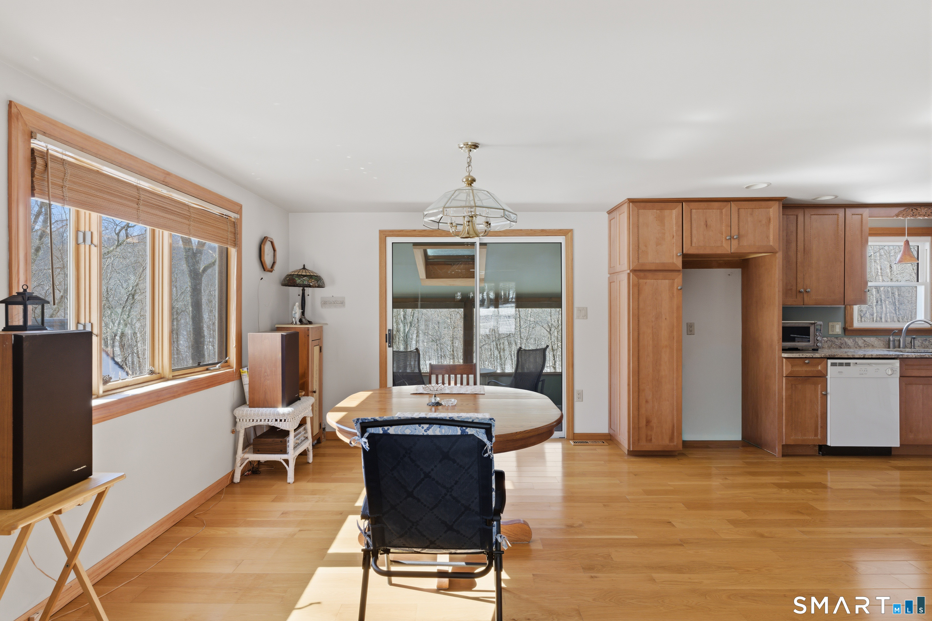 1616 Weed Road Torrington, CT 06790 - Photo 5 of 40 a living room with furniture and a kitchen