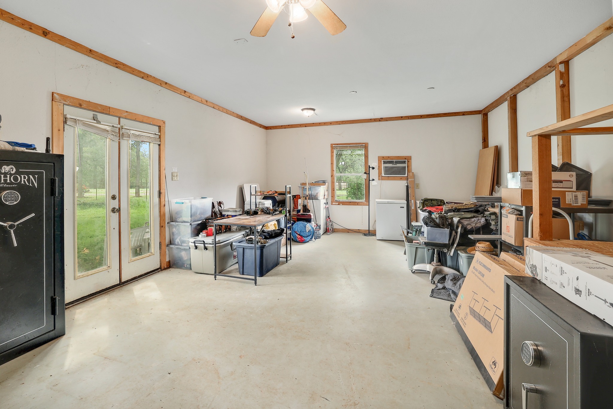 288 The Forest Road Dale, TX 78616 - Photo 21 of 31 a living room with furniture and a large window