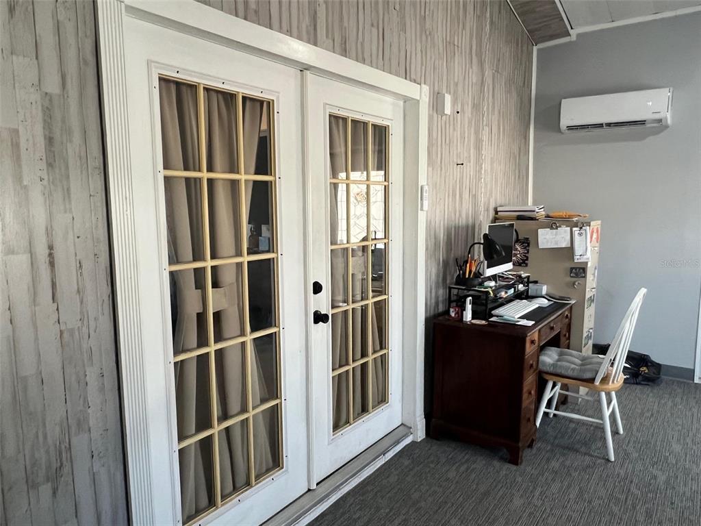 1001 Starkey Road, Unit 731 Largo, FL 33771 - Photo 14 of 35 a view of a workspace with furniture and a window