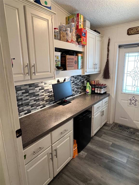 1001 Starkey Road, Unit 731 Largo, FL 33771 - Photo 18 of 35 a kitchen with granite countertop a sink stove and cabinets