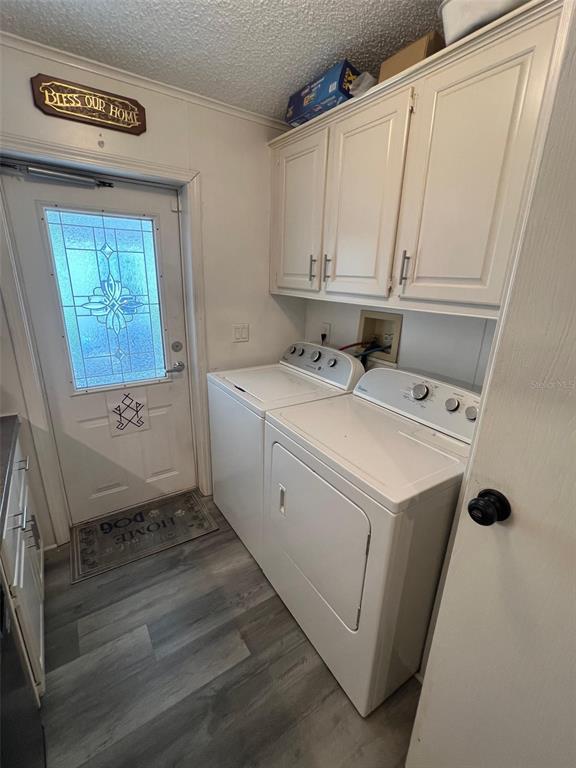 1001 Starkey Road, Unit 731 Largo, FL 33771 - Photo 19 of 35 a utility room with washer and dryer