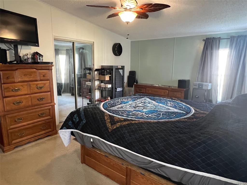 1001 Starkey Road, Unit 731 Largo, FL 33771 - Photo 21 of 35 a kitchen with a appliances and chandelier