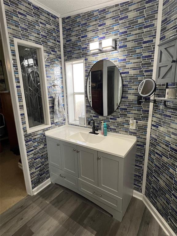 1001 Starkey Road, Unit 731 Largo, FL 33771 - Photo 25 of 35 a bathroom with a sink and a mirror