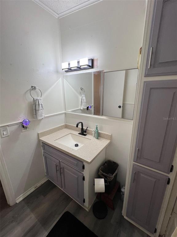 1001 Starkey Road, Unit 731 Largo, FL 33771 - Photo 34 of 35 a bathroom with a sink and a toilet