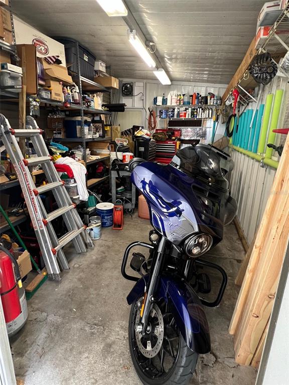 1001 Starkey Road, Unit 731 Largo, FL 33771 - Photo 35 of 35 a view of a storage room with washer and dryer