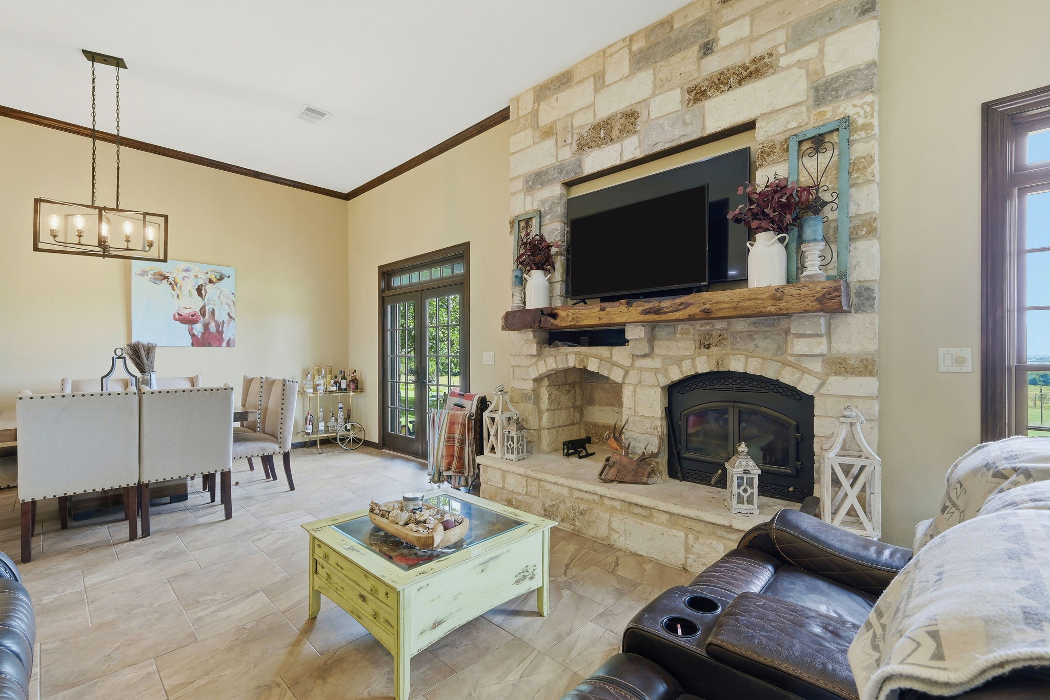 701 County Road 107 Georgetown, TX 78626 - Photo 8 of 30 a living room with furniture a flat screen tv and a fireplace