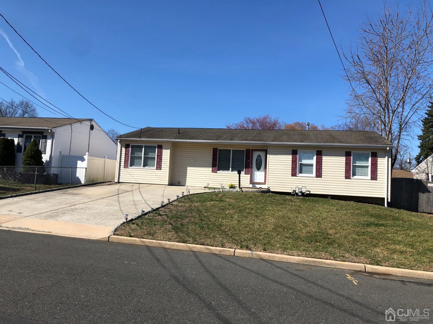 117 Princeton Road Old Bridge, NJ 08859 - Photo 1 of 19 a front view of a house with a garden