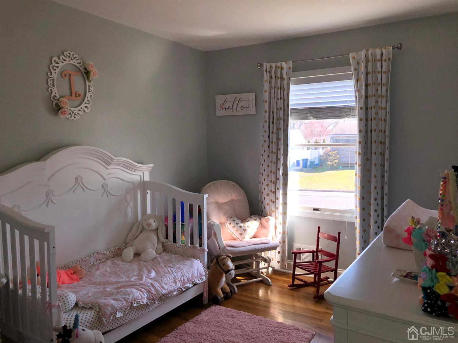 117 Princeton Road Old Bridge, NJ 08859 - Photo 16 of 19 a bedroom with a bed and window
