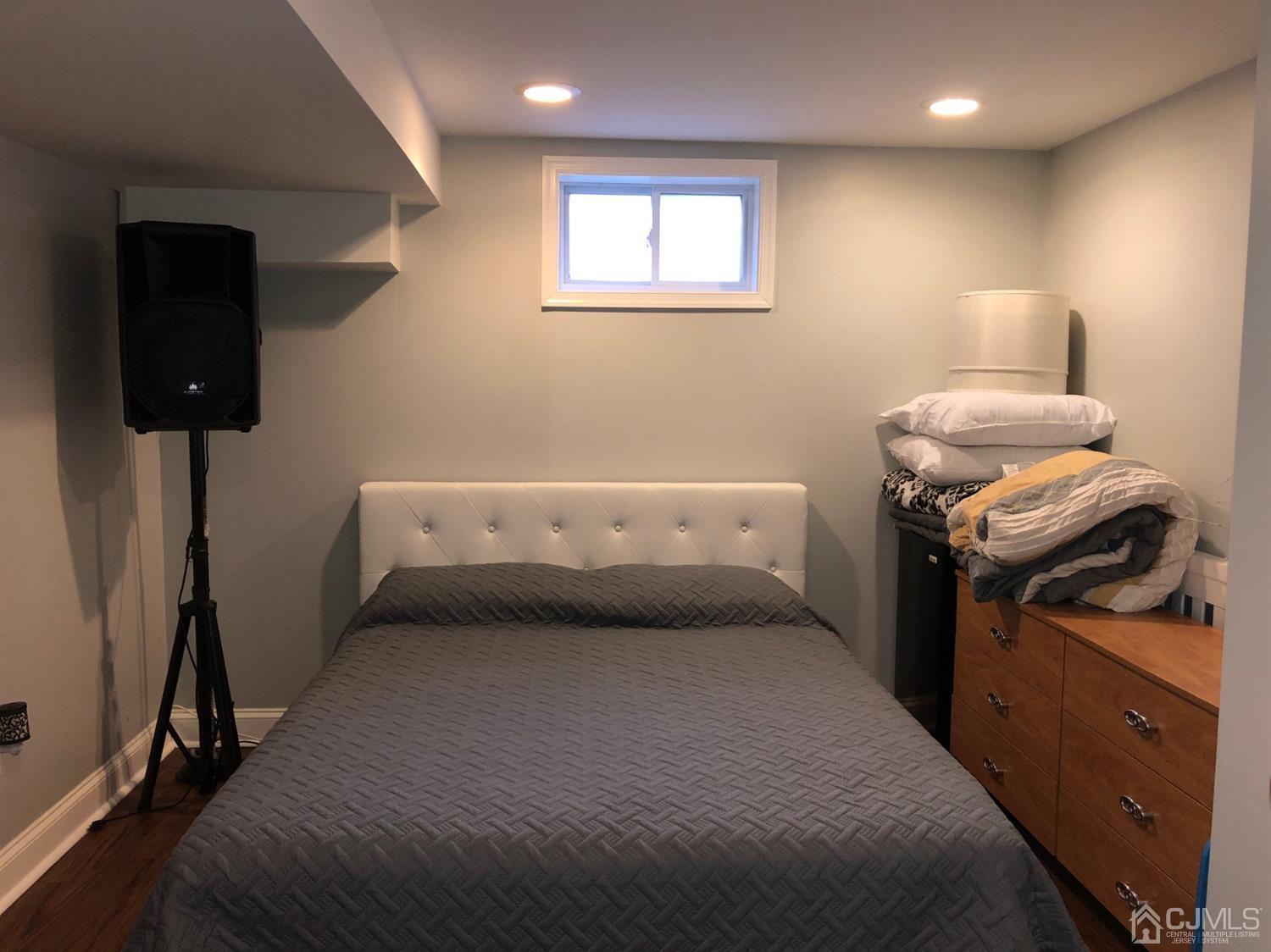 117 Princeton Road Old Bridge, NJ 08859 - Photo 18 of 19 a bedroom with a bed and cabinets