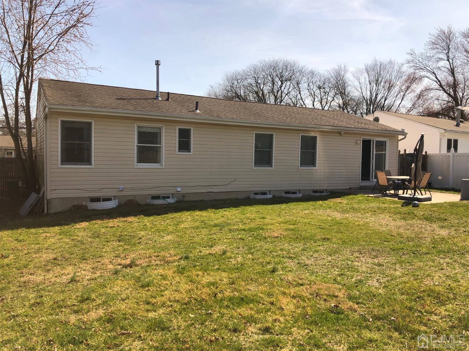 117 Princeton Road Old Bridge, NJ 08859 - Photo 3 of 19 a backyard of a house
