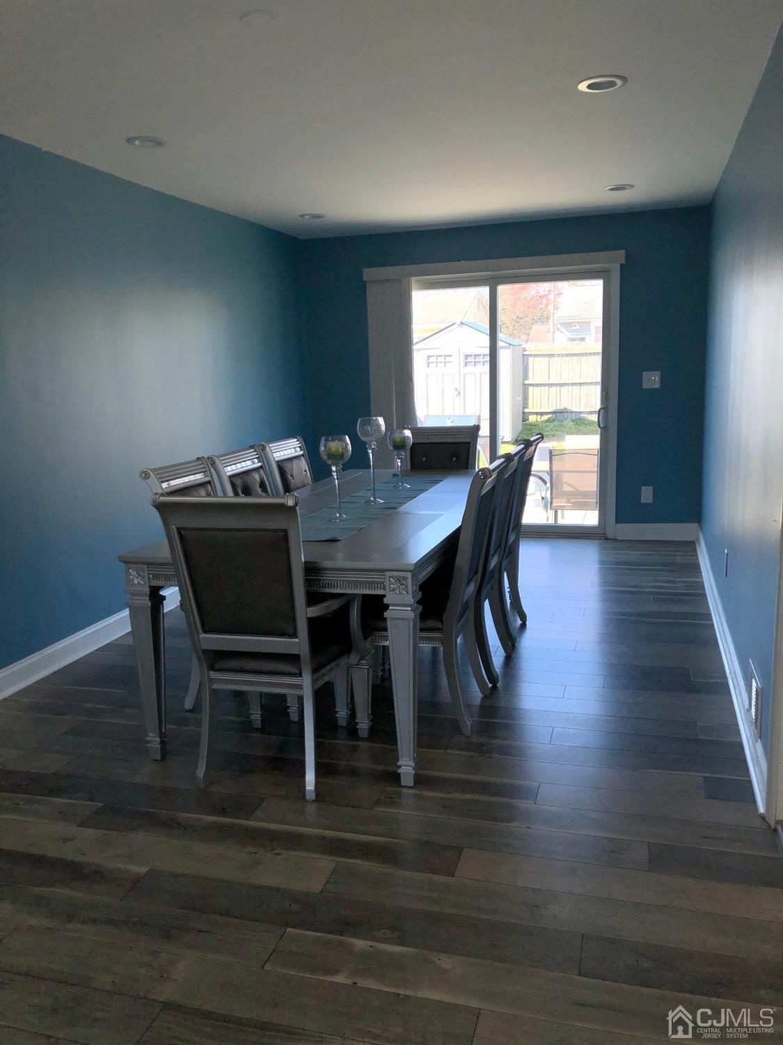 117 Princeton Road Old Bridge, NJ 08859 - Photo 10 of 19 a view of a dining room with furniture window and wooden floor