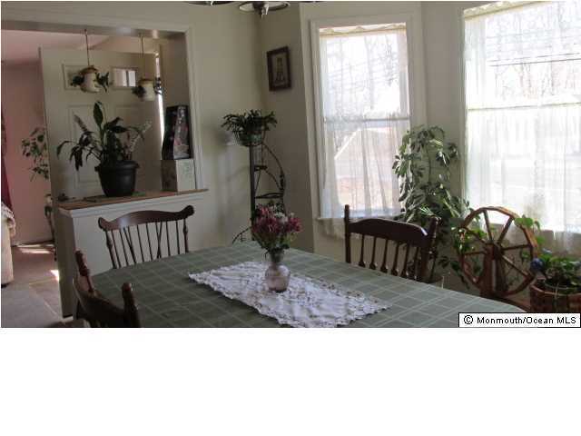 424 Diamond Road Jackson, NJ 08527 - Photo 5 of 22 a black and white photo of a living room