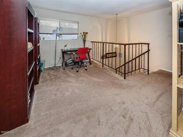 a view of a room with furniture window and a kitchen
