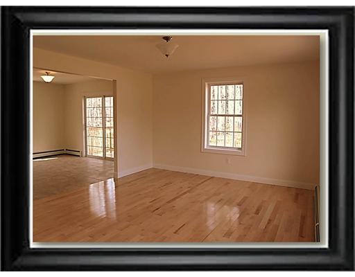 22 Cardinal Circle Standish, ME 04084 - Photo 6 of 15 Living Room.