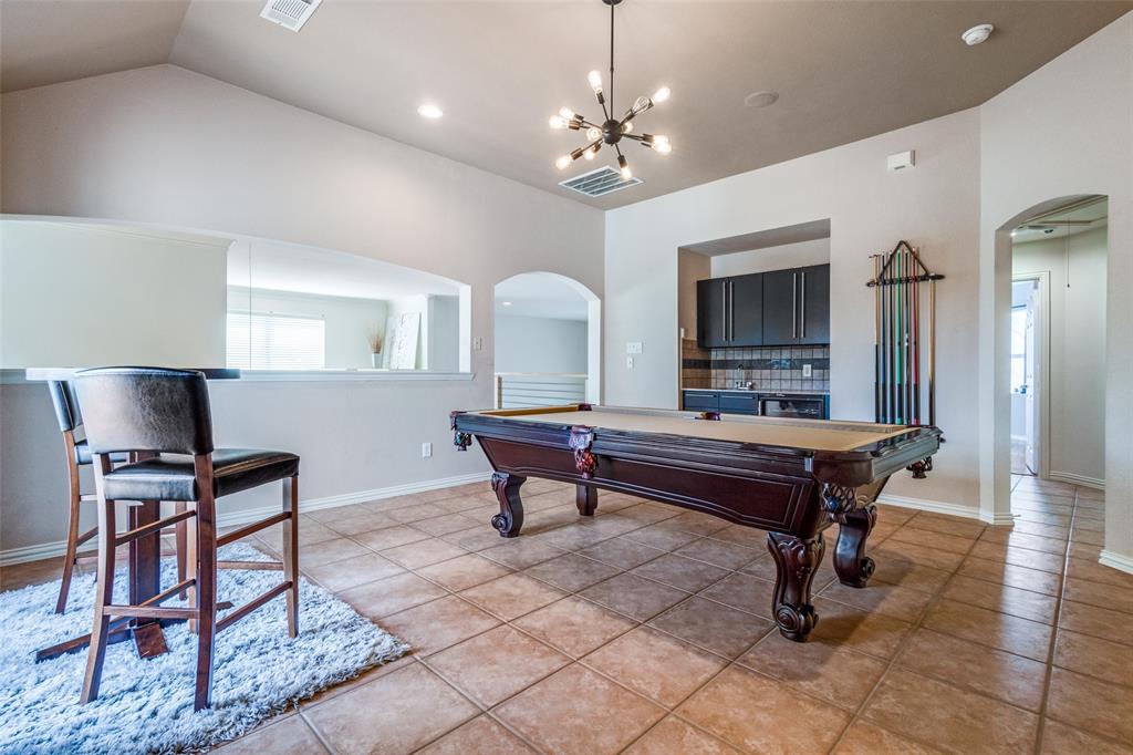 3313 Madison Avenue Hurst, TX 76054 - Photo 8 of 36 Recreation room with loft style open to living room, light tile patterned floors, and pool table.